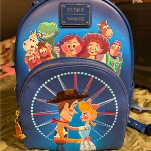 Loungefly Pixar Blue Backpack with Toy Story Characters